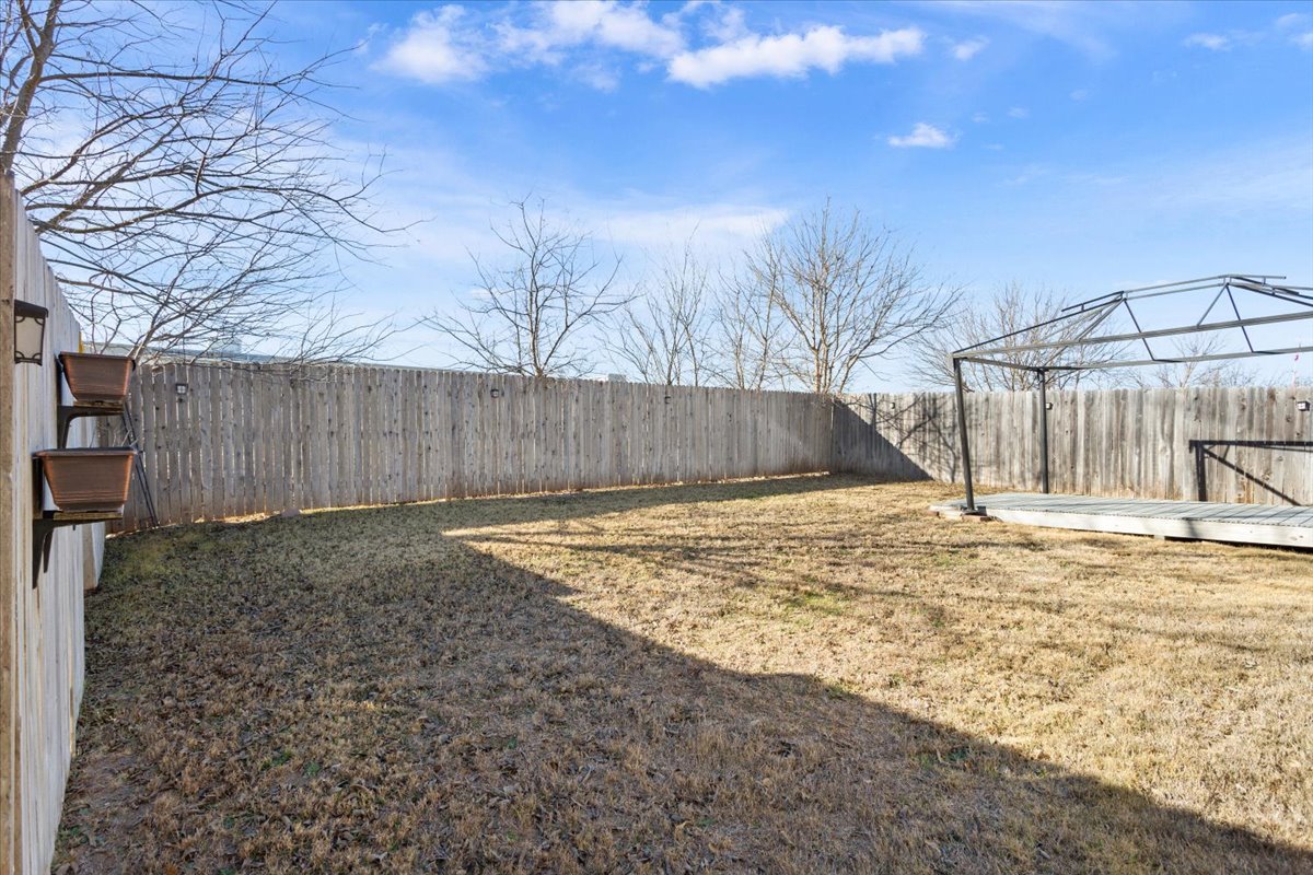 1024 Chad Loop Round Rock, TX 78665 - Photo 29 of 29 Fenced backyard with a wooden deck and a gazebo
