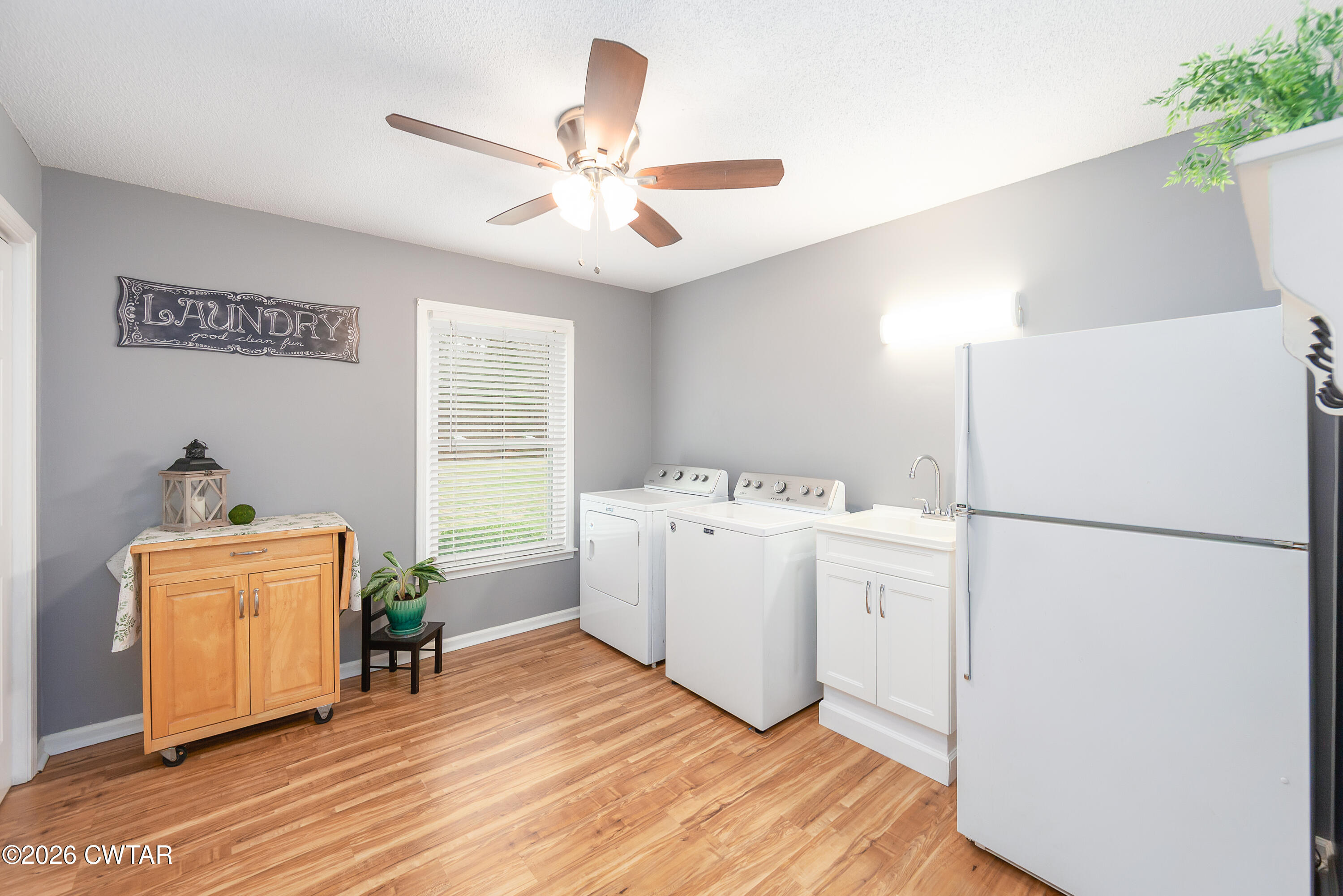 359 Old Bells Road Jackson, TN 38305 - Photo 12 of 40 a view of kitchen with furniture wooden floor and window