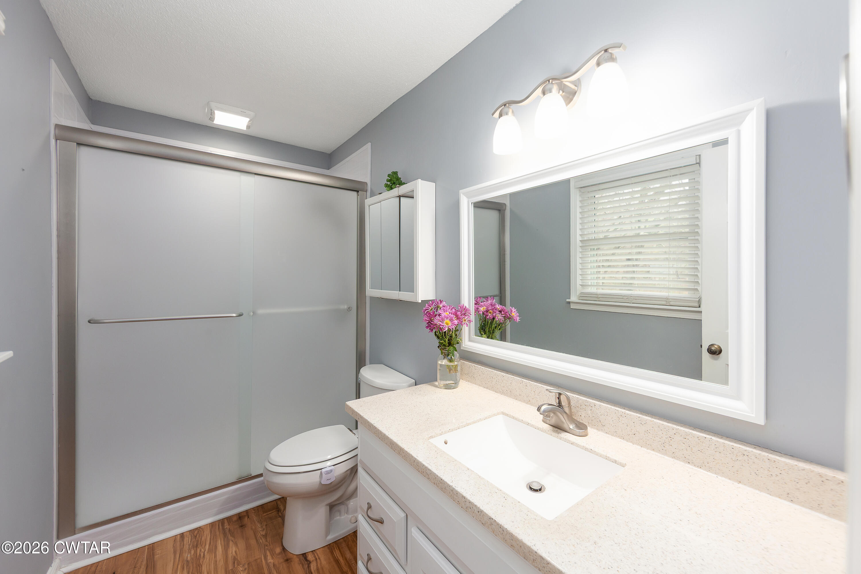 359 Old Bells Road Jackson, TN 38305 - Photo 21 of 40 a bathroom with a sink toilet and shower