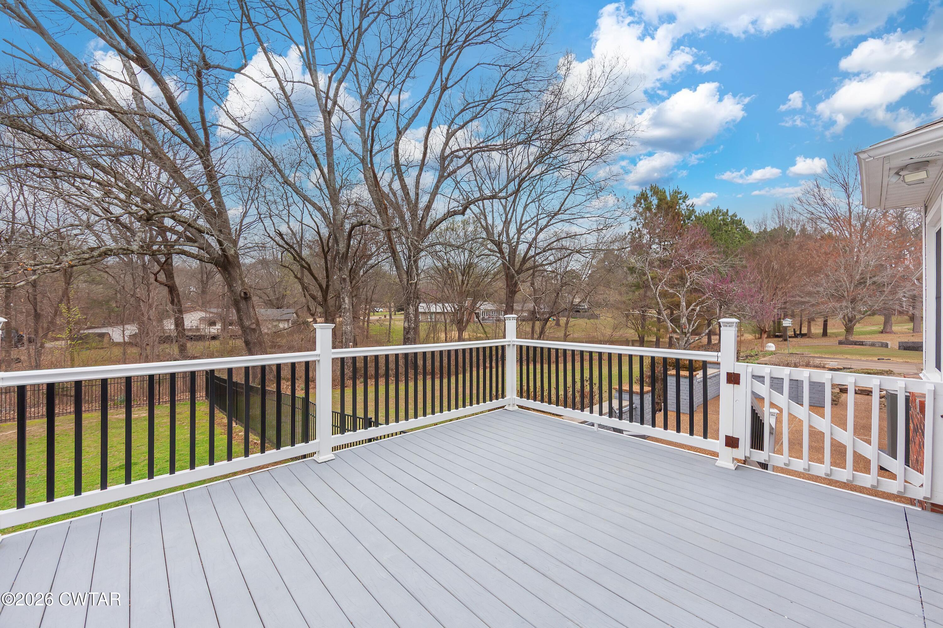 359 Old Bells Road Jackson, TN 38305 - Photo 25 of 40 a view of a wooden roof deck