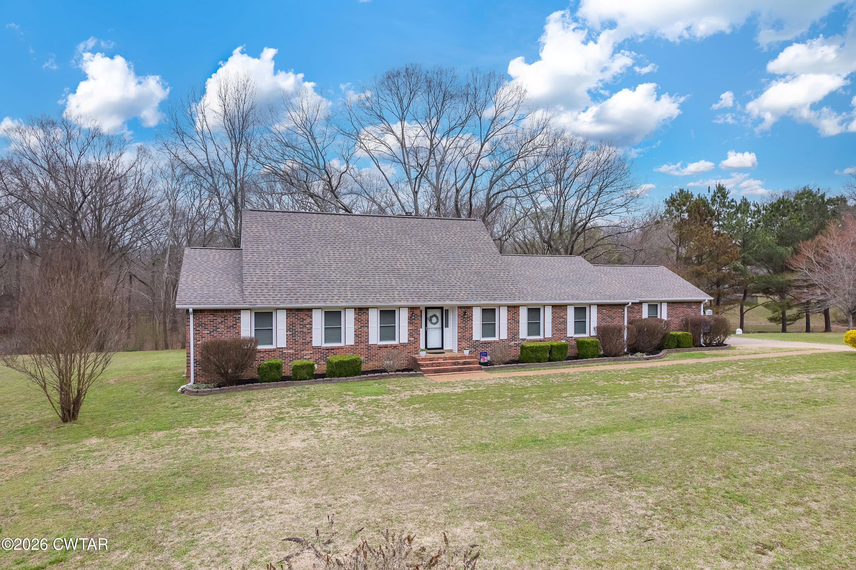 359 Old Bells Road Jackson, TN 38305 - Photo 39 of 40 a front view of a house with garden