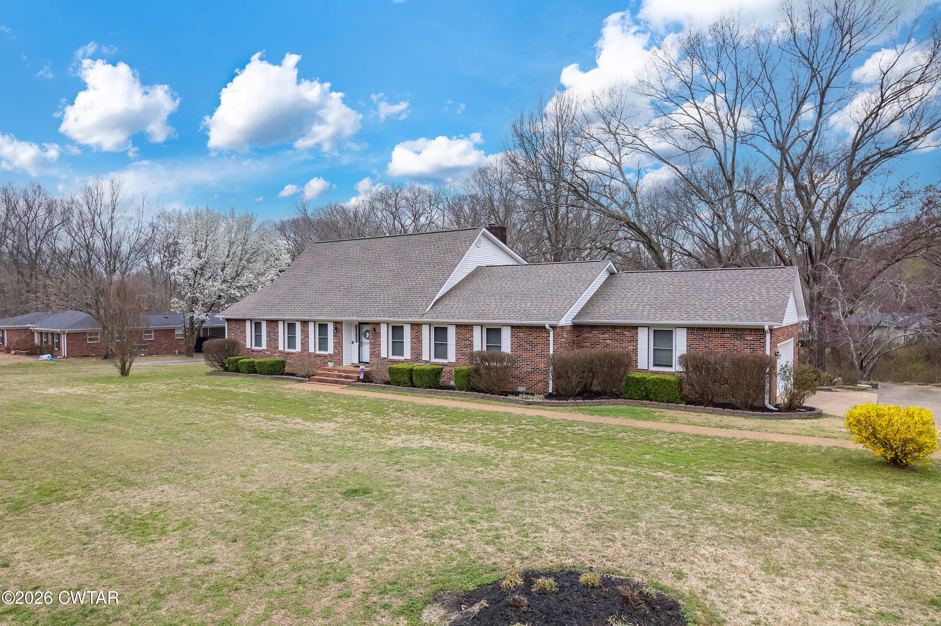359 Old Bells Road Jackson, TN 38305 - Photo 40 of 40 a view of a house with a yard