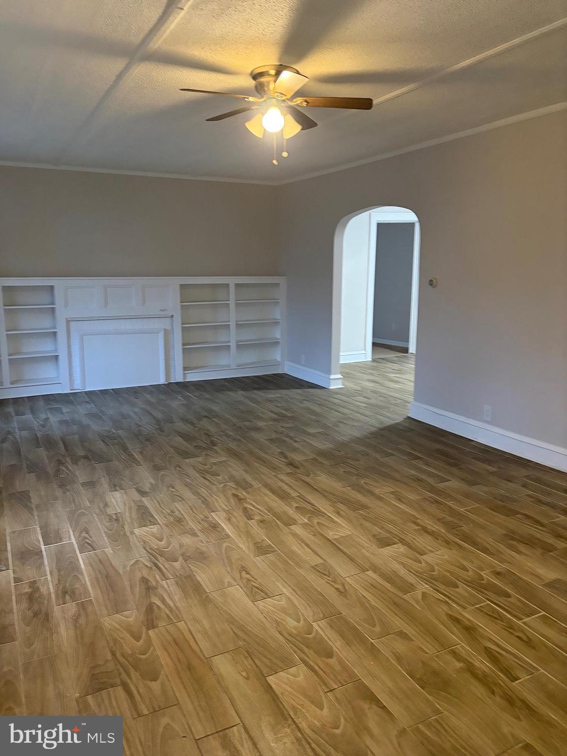 175 9th Street Salem, NJ 08079 - Photo 5 of 24 a view of a livingroom with a ceiling fan and entryway