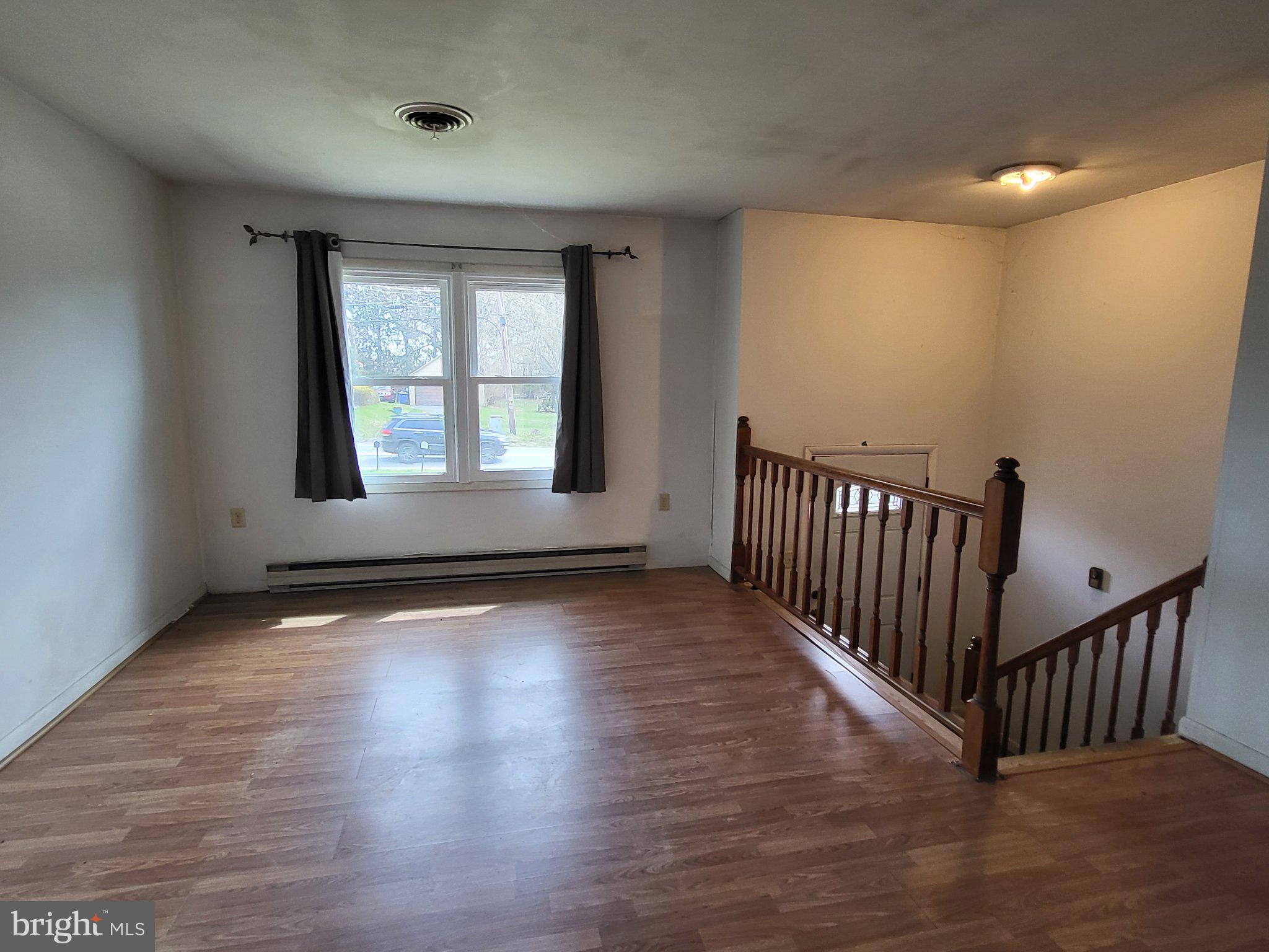 707 Wyndamere Road Lewisberry, PA 17339 - Photo 13 of 15 Spacious living area with natural light.