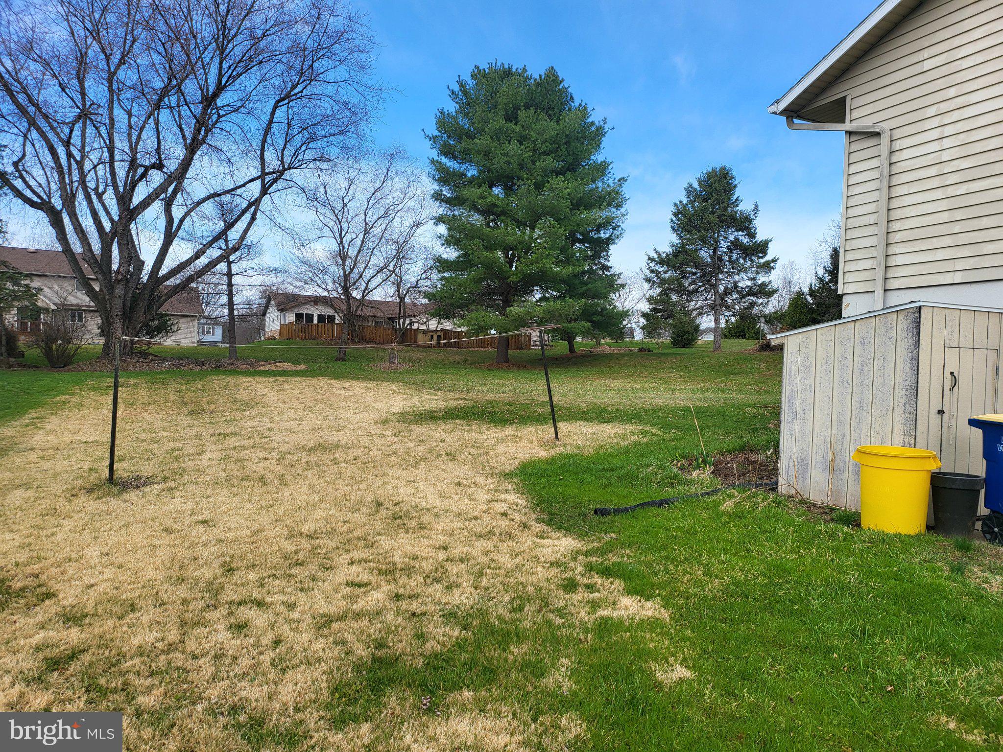 707 Wyndamere Road Lewisberry, PA 17339 - Photo 2 of 15 Spacious yard with lush greenery.