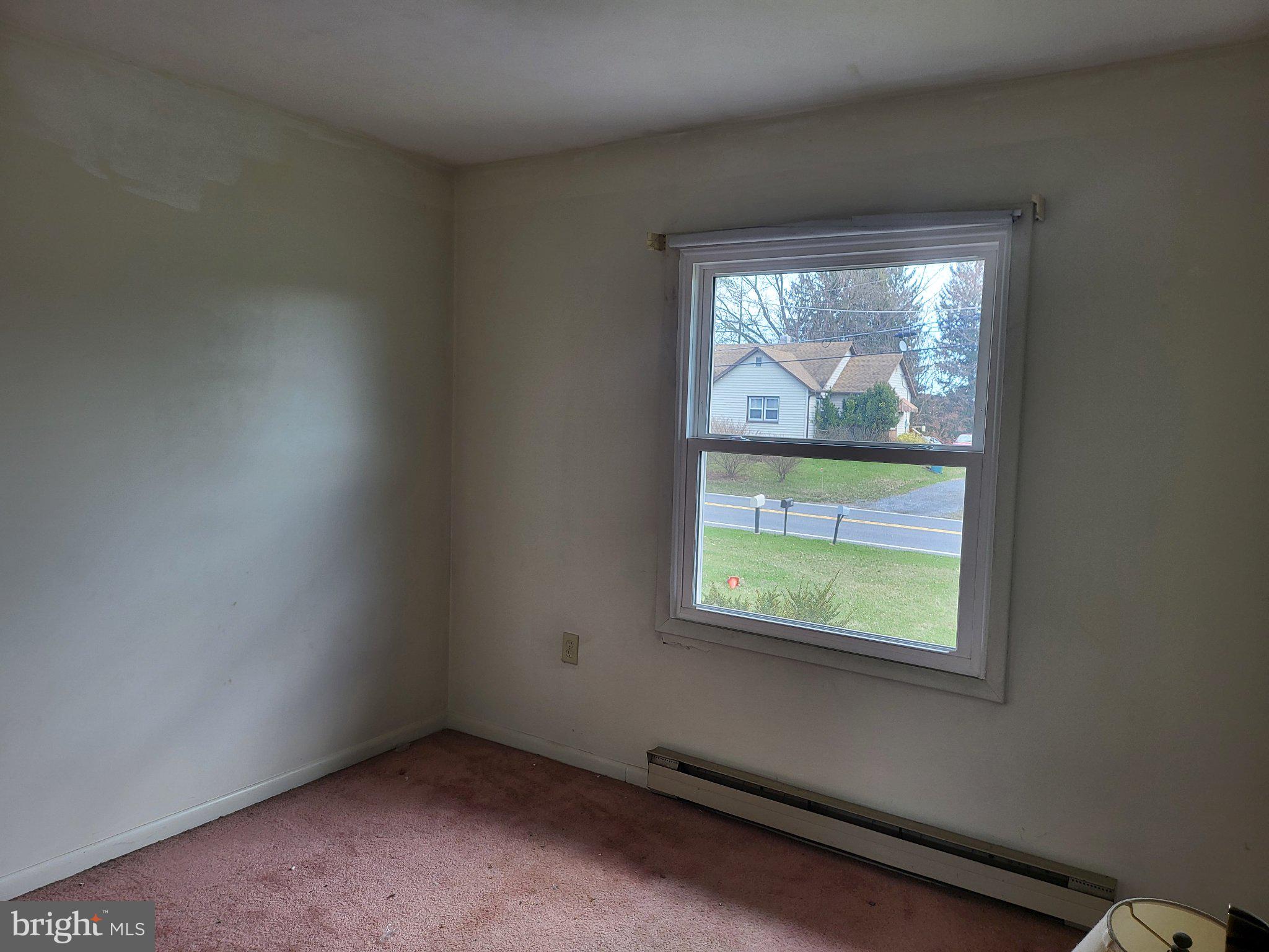 707 Wyndamere Road Lewisberry, PA 17339 - Photo 10 of 15 Bright, airy room with street view.