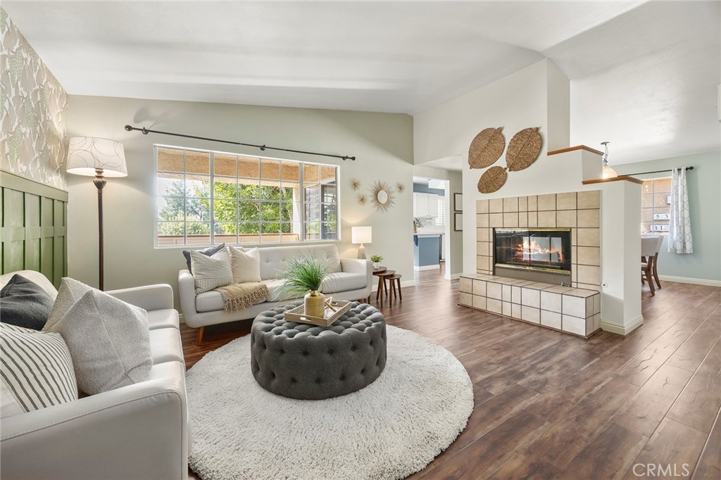 5370 Silver Canyon Road, Unit 7E Yorba Linda, CA 92887 - Photo 1 of 33 a living room with furniture and a fireplace