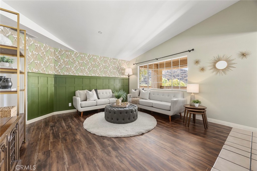 5370 Silver Canyon Road, Unit 7E Yorba Linda, CA 92887 - Photo 13 of 33 a living room with furniture and a wooden floor