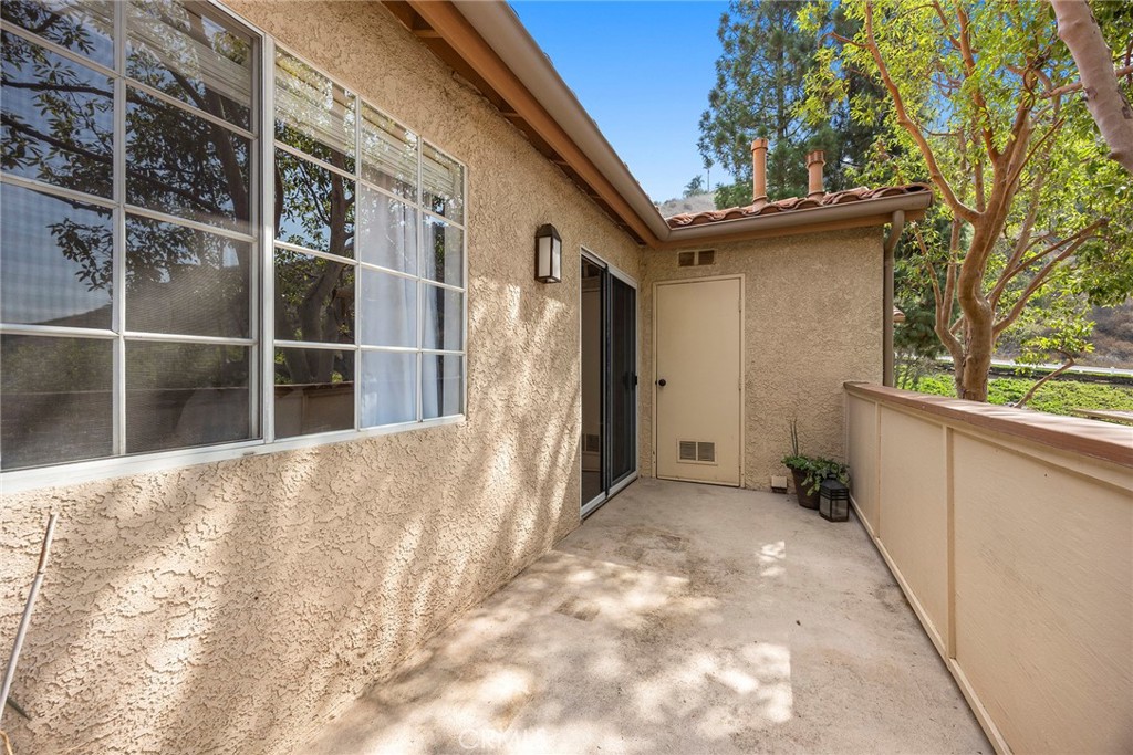 5370 Silver Canyon Road, Unit 7E Yorba Linda, CA 92887 - Photo 21 of 33 a view of a house with a large window