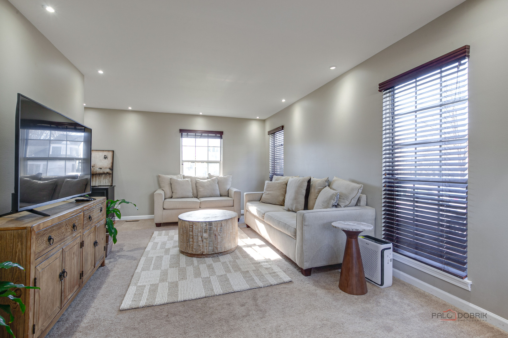6291 Eagle Ridge Drive Gurnee, IL 60031 - Photo 13 of 40 a living room with furniture and a flat screen tv