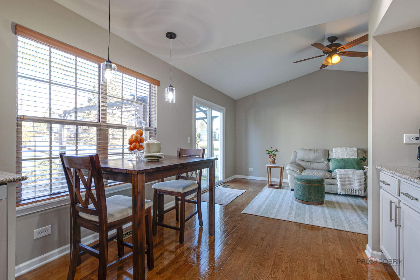 6291 Eagle Ridge Drive Gurnee, IL 60031 - Photo 21 of 40 a view of a dining room with furniture window and wooden floor