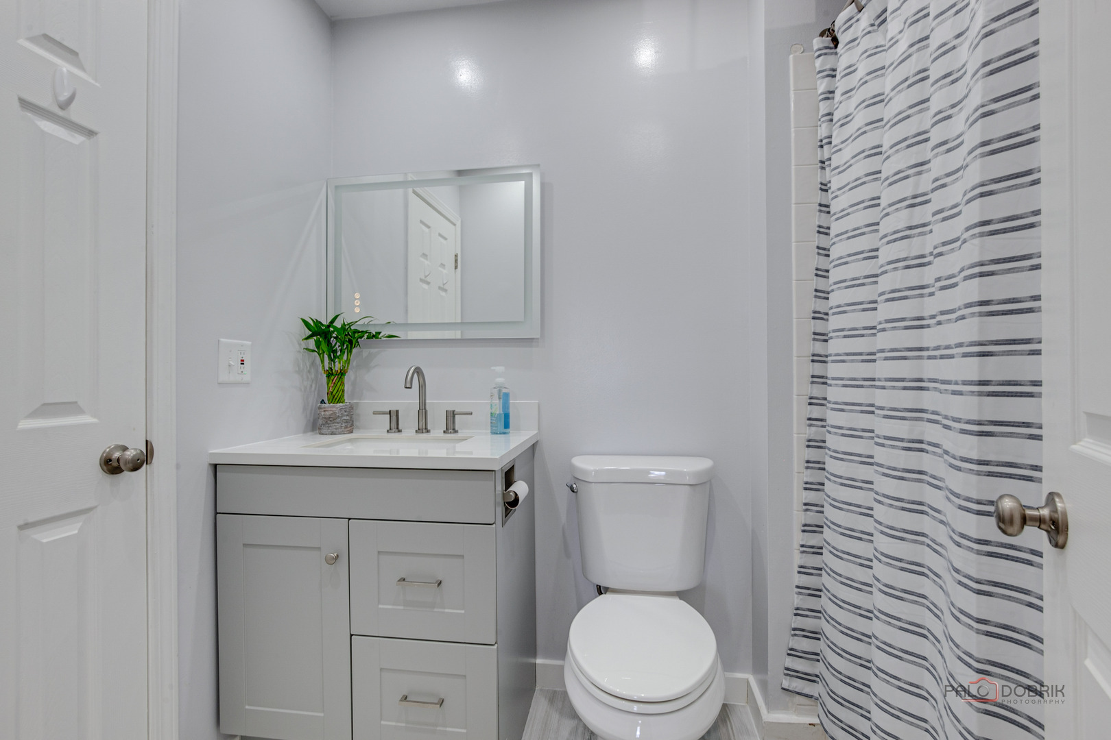 6291 Eagle Ridge Drive Gurnee, IL 60031 - Photo 25 of 40 a bathroom with a granite countertop toilet sink and mirror