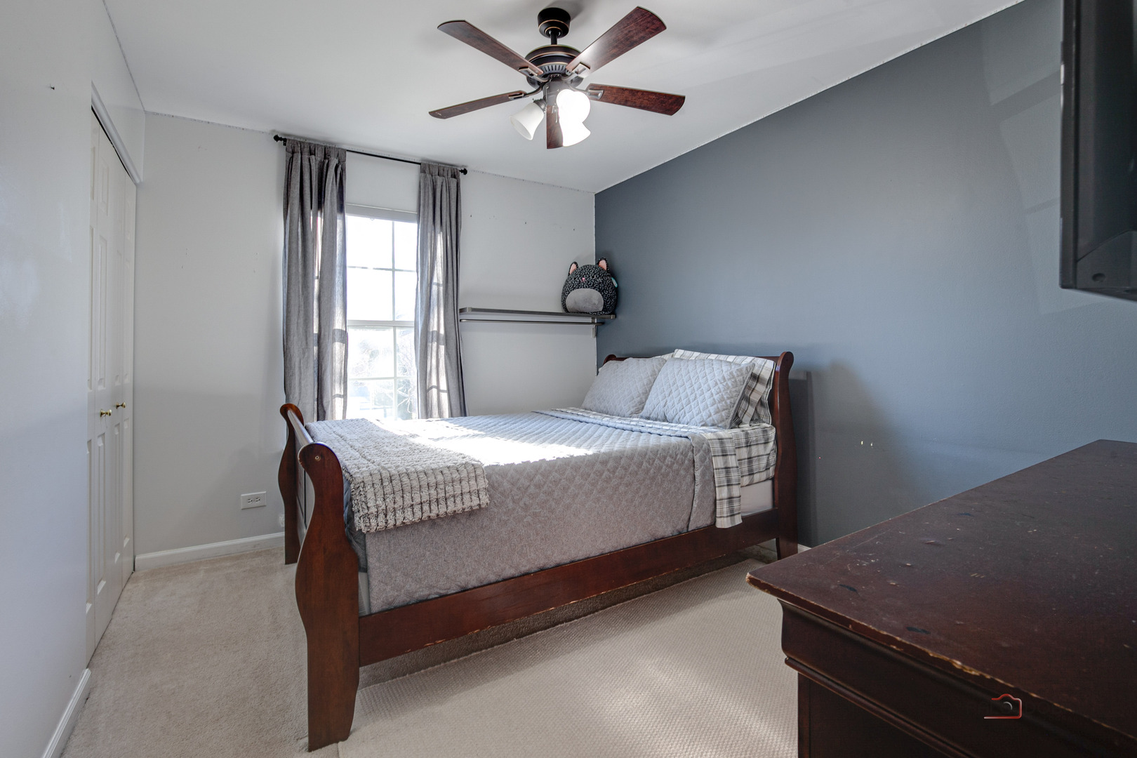 6291 Eagle Ridge Drive Gurnee, IL 60031 - Photo 29 of 40 a bedroom with a bed and a window