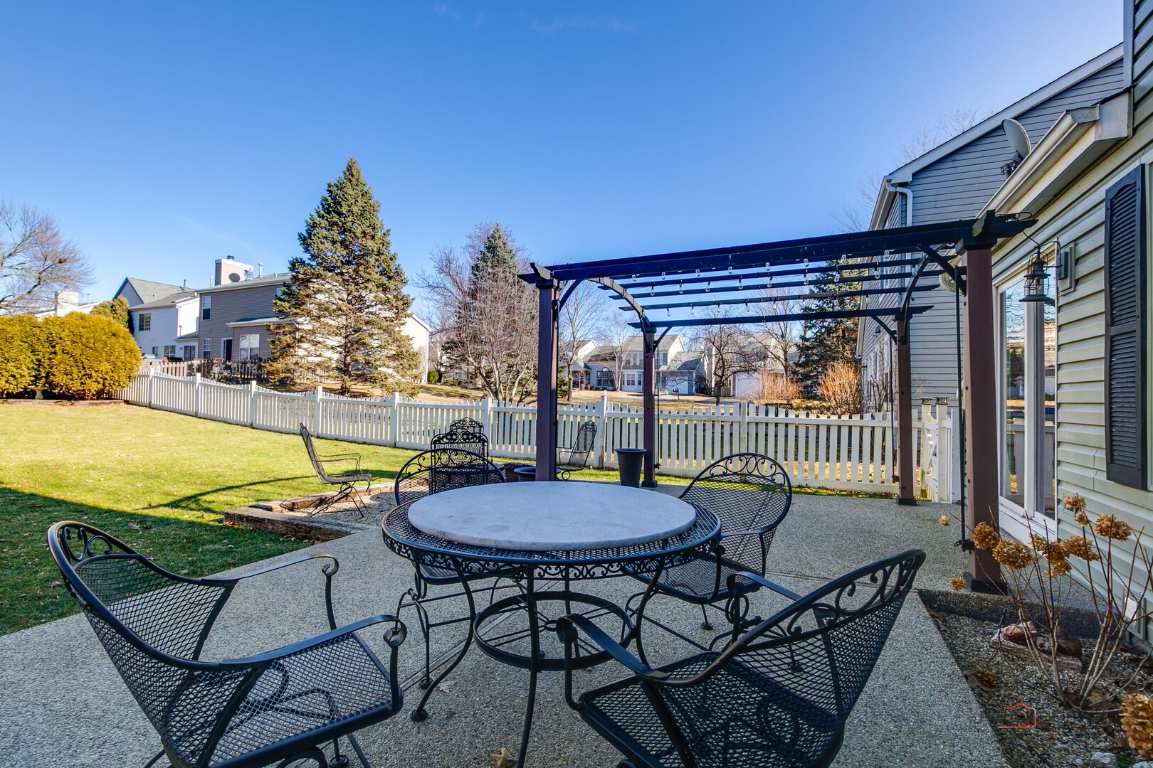 6291 Eagle Ridge Drive Gurnee, IL 60031 - Photo 33 of 40 a view of a swimming pool with a lounge chairs