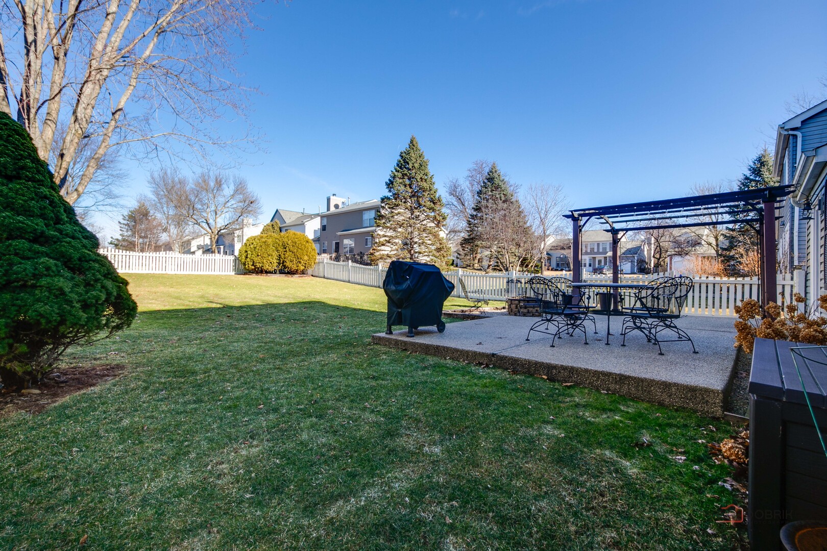 6291 Eagle Ridge Drive Gurnee, IL 60031 - Photo 35 of 40 a view of a backyard with sitting area