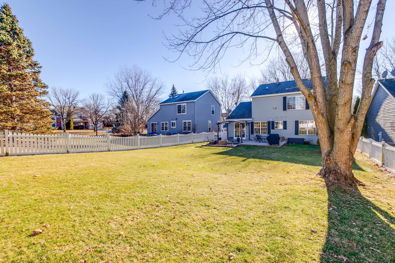 6291 Eagle Ridge Drive Gurnee, IL 60031 - Photo 39 of 40 a swimming pool with outdoor seating and yard