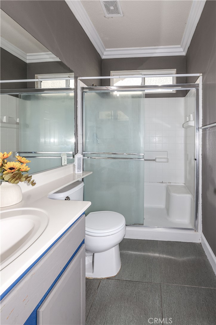 1367 Esplanade Drive Merced, CA 95348 - Photo 19 of 51 a bathroom with a sink toilet and shower