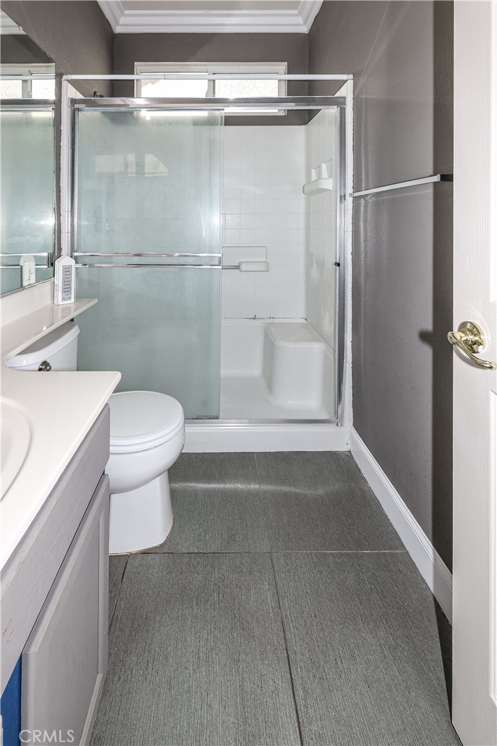1367 Esplanade Drive Merced, CA 95348 - Photo 20 of 51 a bathroom with a granite countertop sink toilet and shower