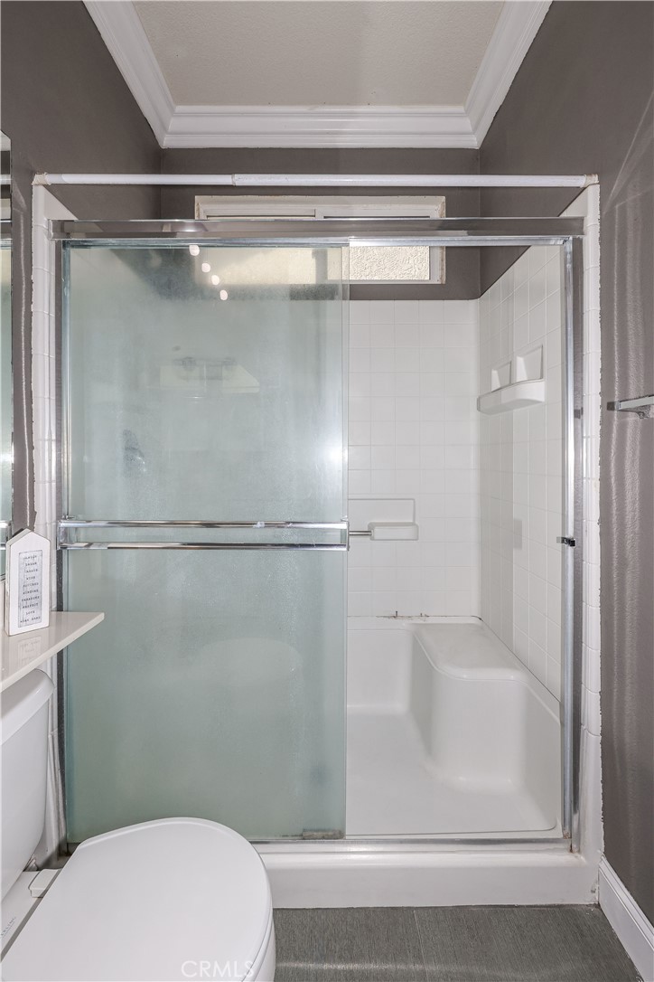 1367 Esplanade Drive Merced, CA 95348 - Photo 21 of 51 a bathroom with a shower and toilet