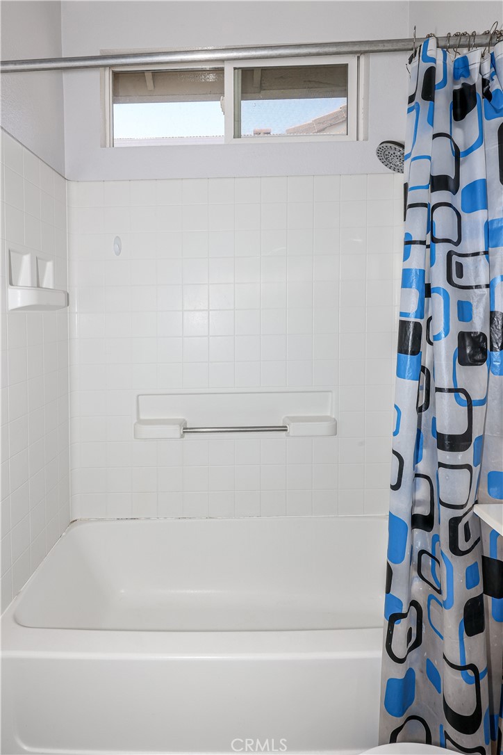 1367 Esplanade Drive Merced, CA 95348 - Photo 25 of 51 a bathroom with a bathtub and a shower