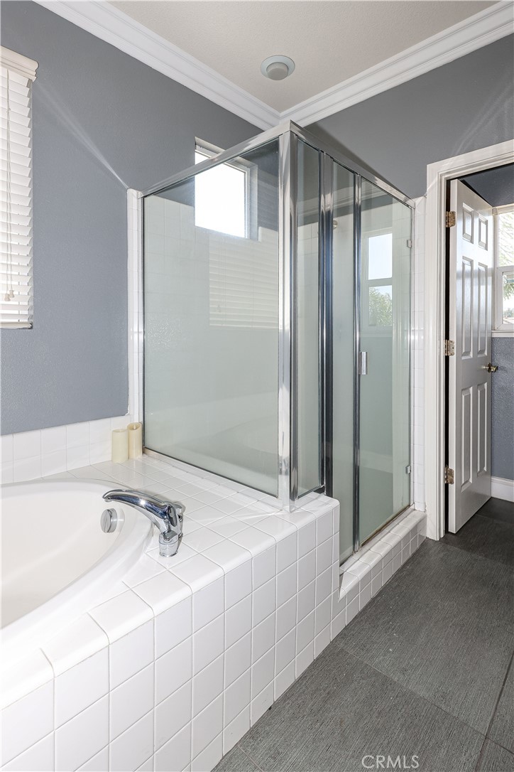 1367 Esplanade Drive Merced, CA 95348 - Photo 37 of 51 a bathroom with a bathtub and a sink