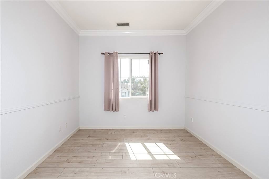 1367 Esplanade Drive Merced, CA 95348 - Photo 41 of 51 an empty room with a window