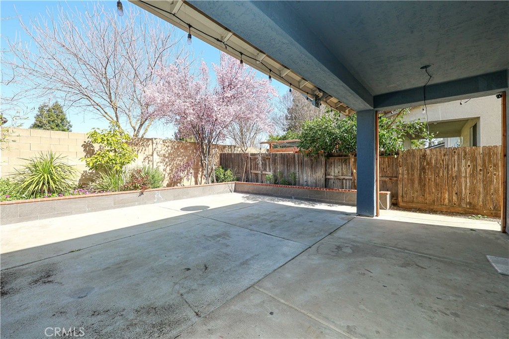 1367 Esplanade Drive Merced, CA 95348 - Photo 43 of 51 a view of a house with backyard and tree