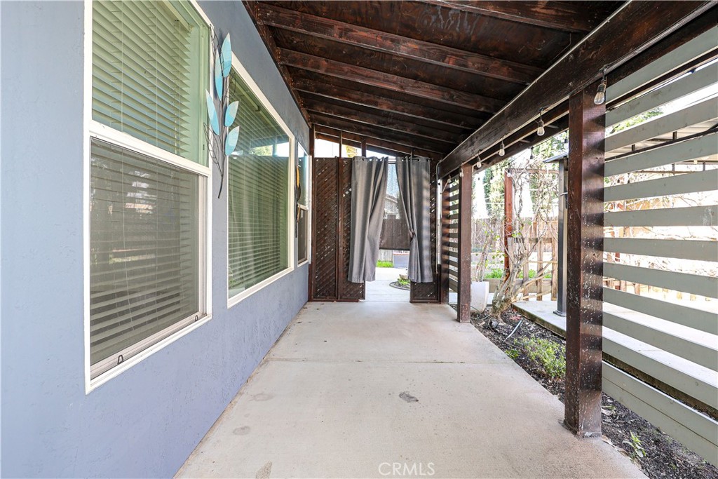 1367 Esplanade Drive Merced, CA 95348 - Photo 47 of 51 a view of a porch with wooden floor and stairs
