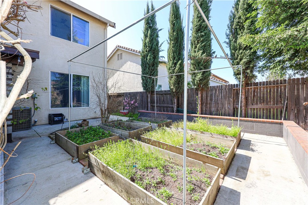 1367 Esplanade Drive Merced, CA 95348 - Photo 48 of 51 a view of backyard with swimming pool and patio