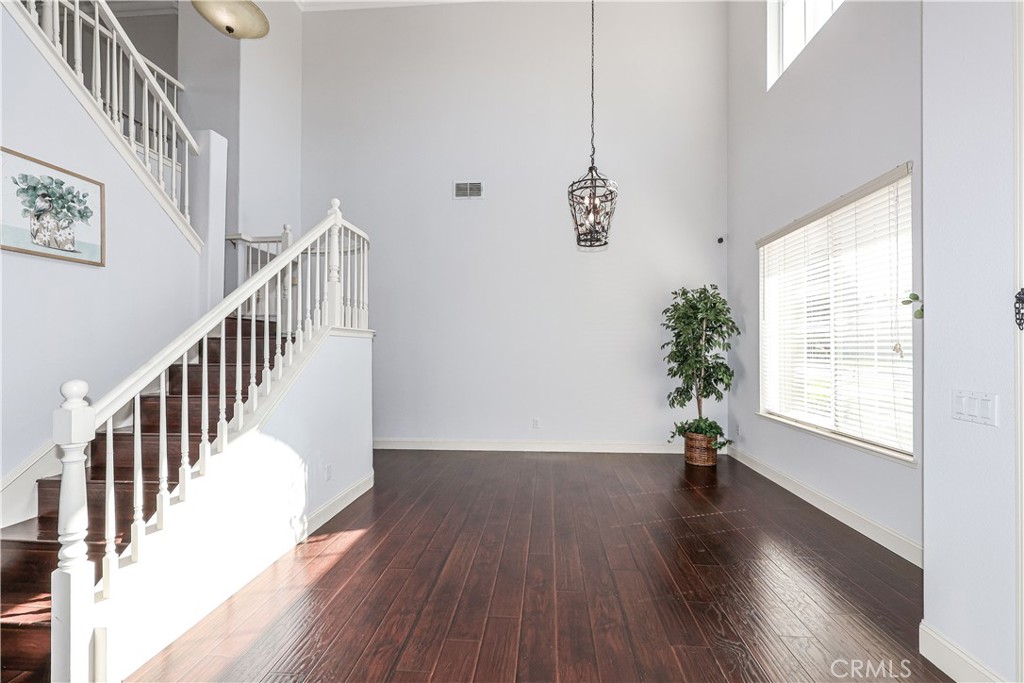 1367 Esplanade Drive Merced, CA 95348 - Photo 5 of 51 a view of an entryway with wooden floor