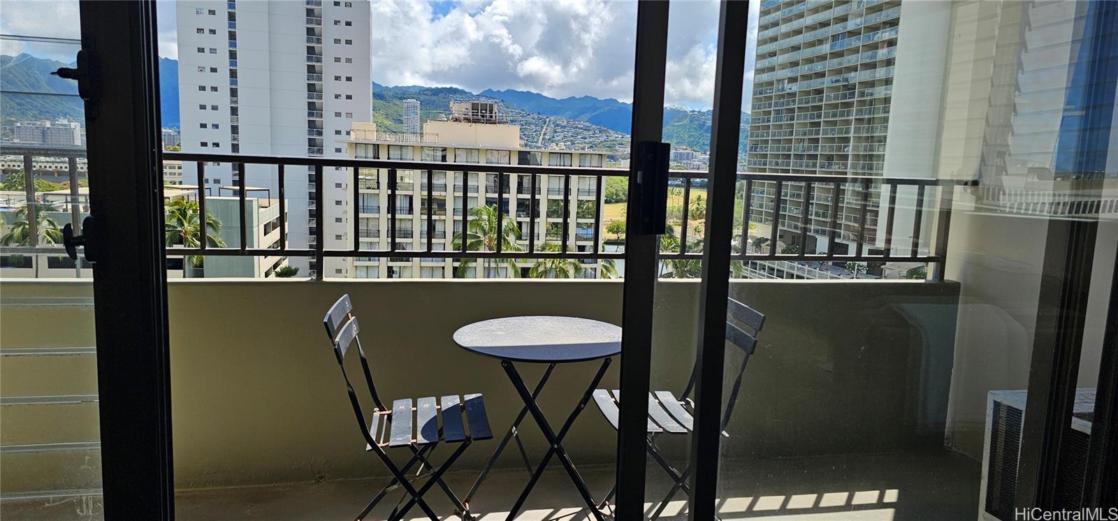 2240 Kūhiō Avenue, Unit 905 Honolulu, HI 96815 - Photo 4 of 18 a view of a balcony with chairs