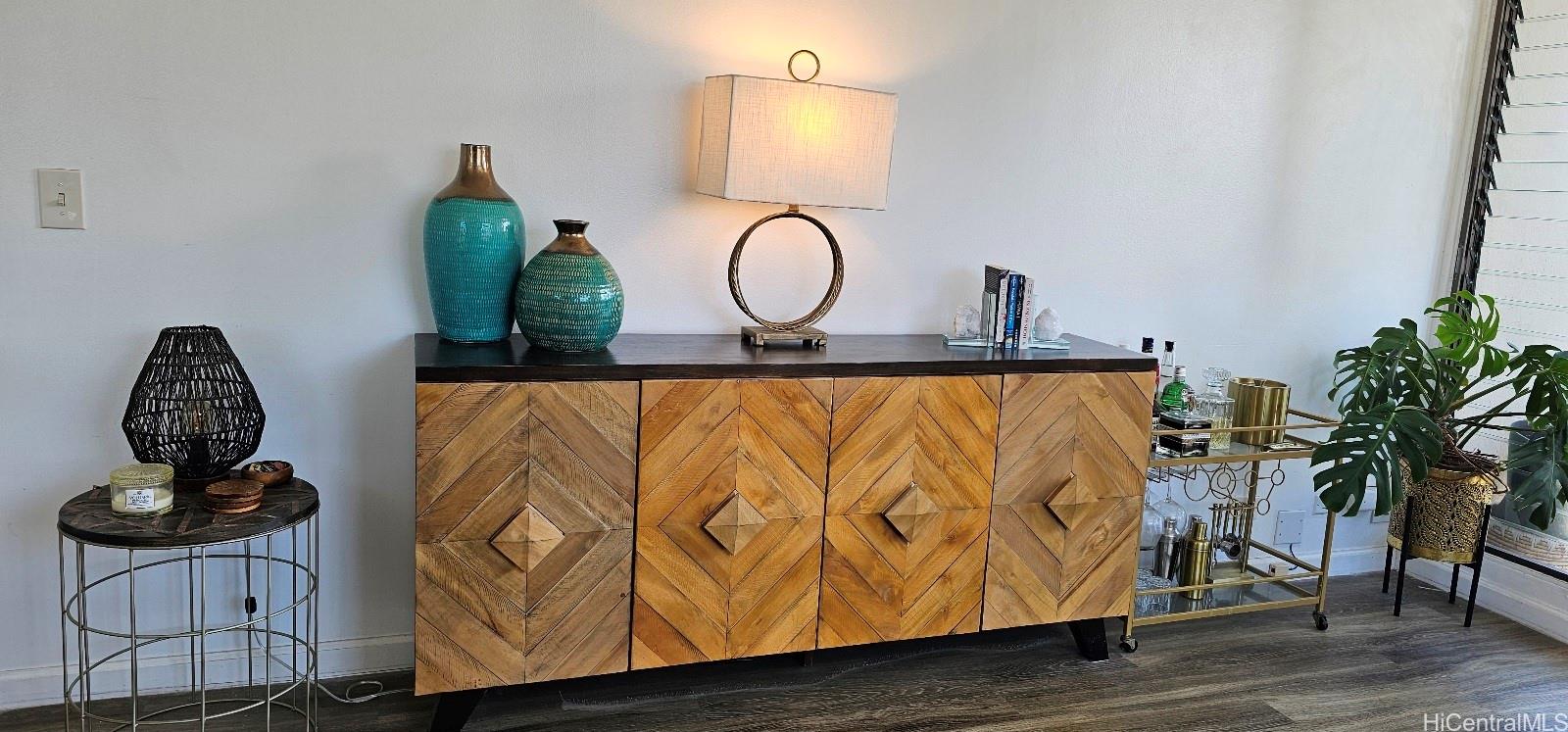 2240 Kūhiō Avenue, Unit 905 Honolulu, HI 96815 - Photo 5 of 18 a bathroom with a granite countertop sink and a mirror
