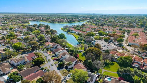 an aerial view of a city with lots of residential buildings