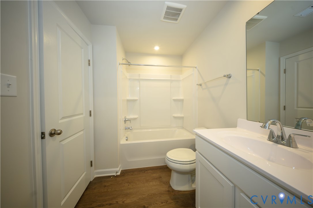 1121 Canterbury Ridge Road Richmond, VA 23224 - Photo 28 of 53 Bathroom featuring a white vanity with integrated