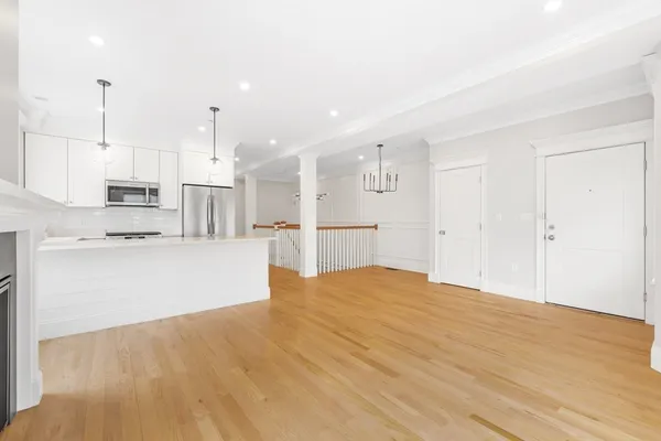 a view of kitchen with wooden floor