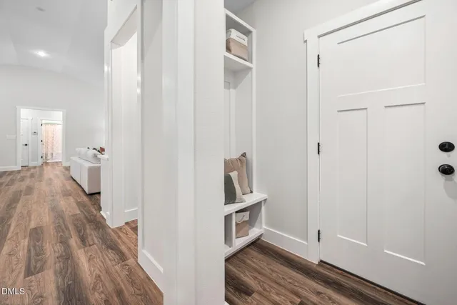 a bathroom with a sink a mirror and a window