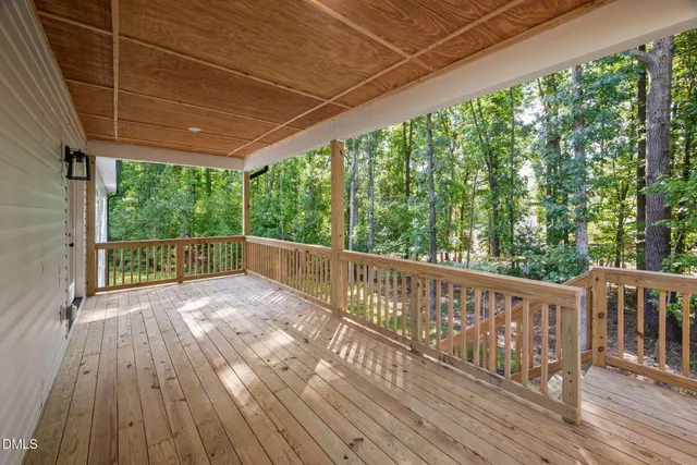 a view of backyard with a small cabin