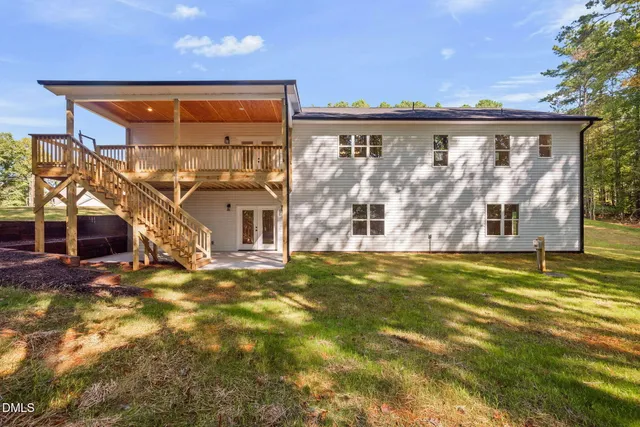 a view of swimming pool with a yard