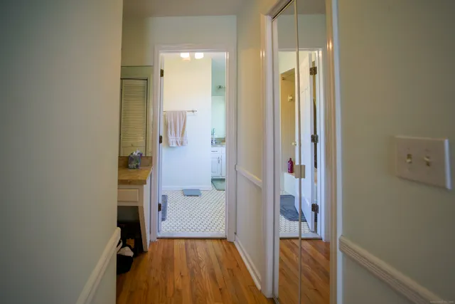 a view of a bathroom with a tub and shower