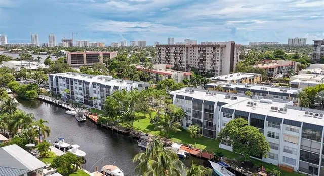 a view of a lake with building in front of it