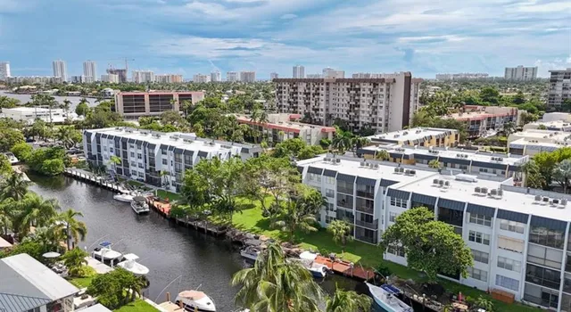 a view of a lake with building in front of it