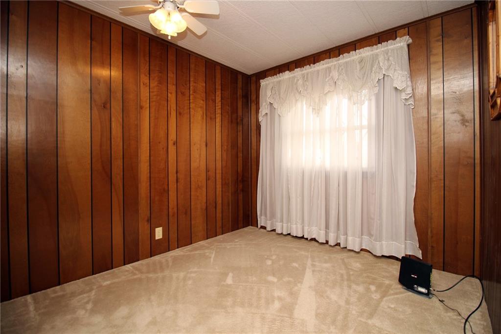 478 Cecil-Henderson Road Cecil, PA 15321 - Photo 17 of 28 a view of a closet with wooden walls