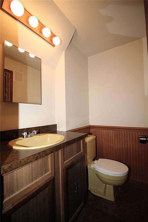 478 Cecil-Henderson Road Cecil, PA 15321 - Photo 21 of 28 a bathroom with a toilet a sink and mirror