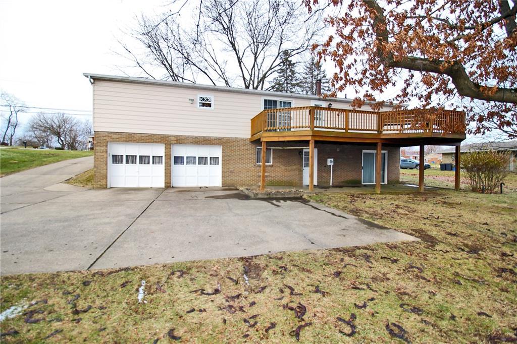 478 Cecil-Henderson Road Cecil, PA 15321 - Photo 24 of 28 a front view of a house with garden