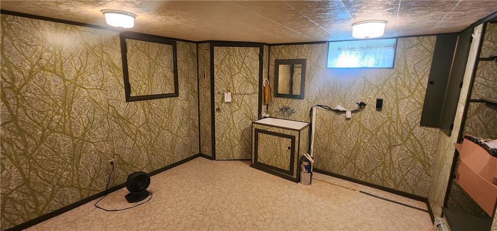 110 Lammert Road Indiana, PA 15701 - Photo 21 of 24 a view of a hallway with wooden walls