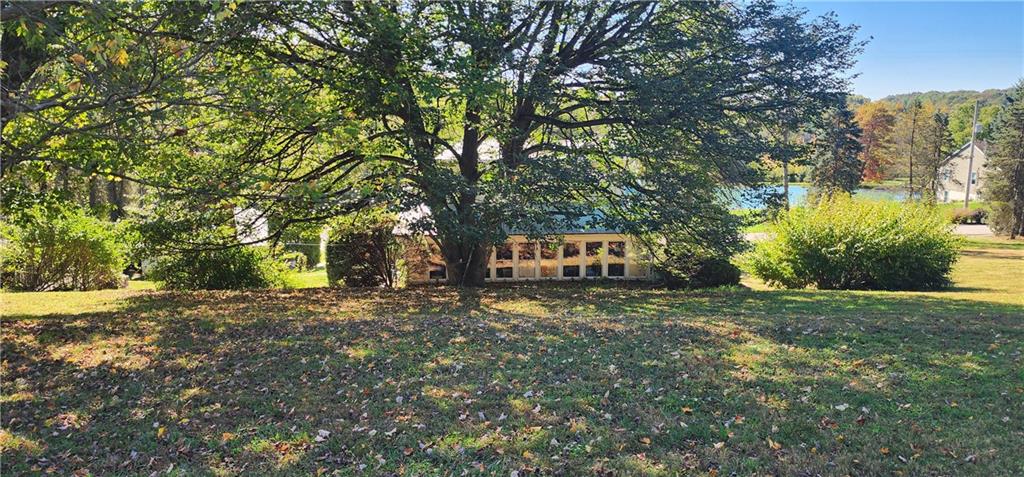 110 Lammert Road Indiana, PA 15701 - Photo 22 of 24 a house with trees in front of it
