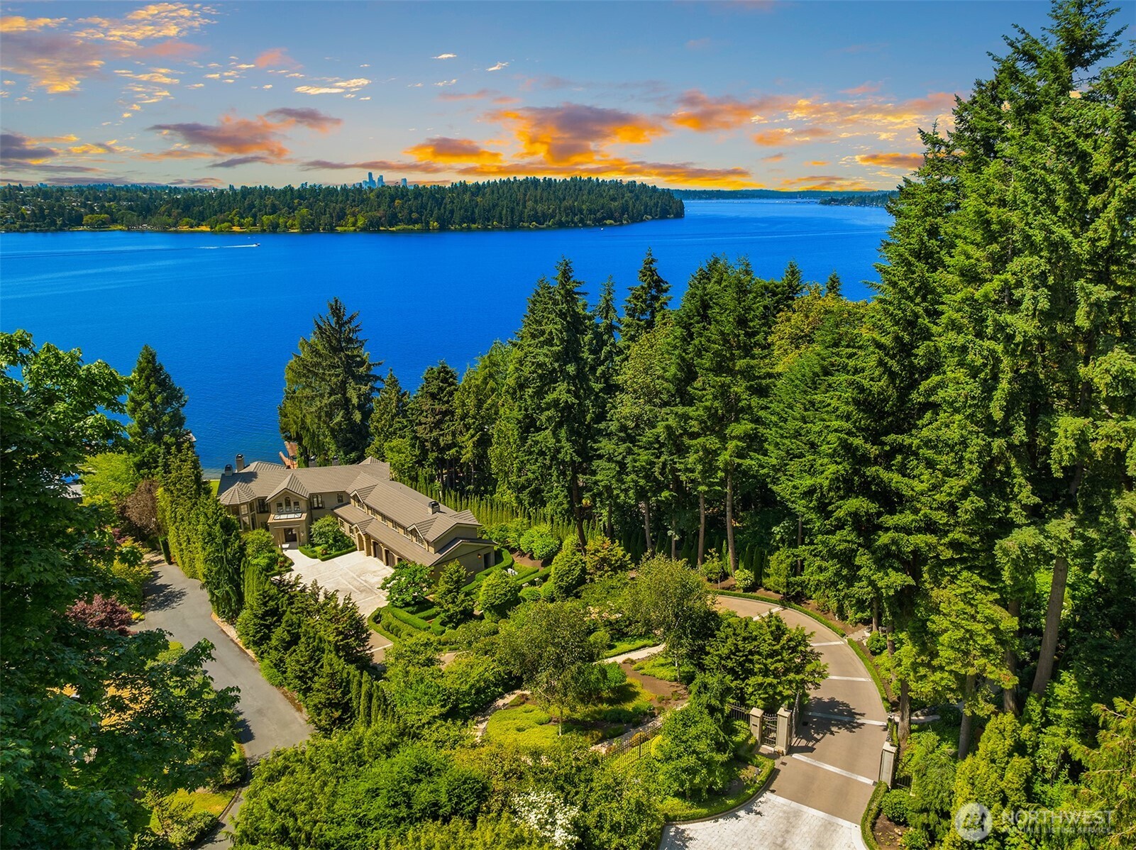 Undisclosed Address Mercer Island, WA 98040 - Photo 1 of 28 a view of a lake with a city view