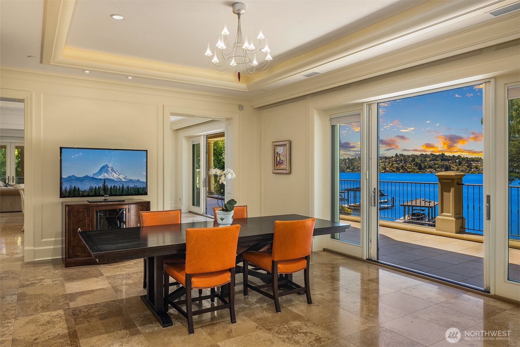 Undisclosed Address Mercer Island, WA 98040 - Photo 12 of 28 a view of a dining room with furniture a chandelier and wooden floor