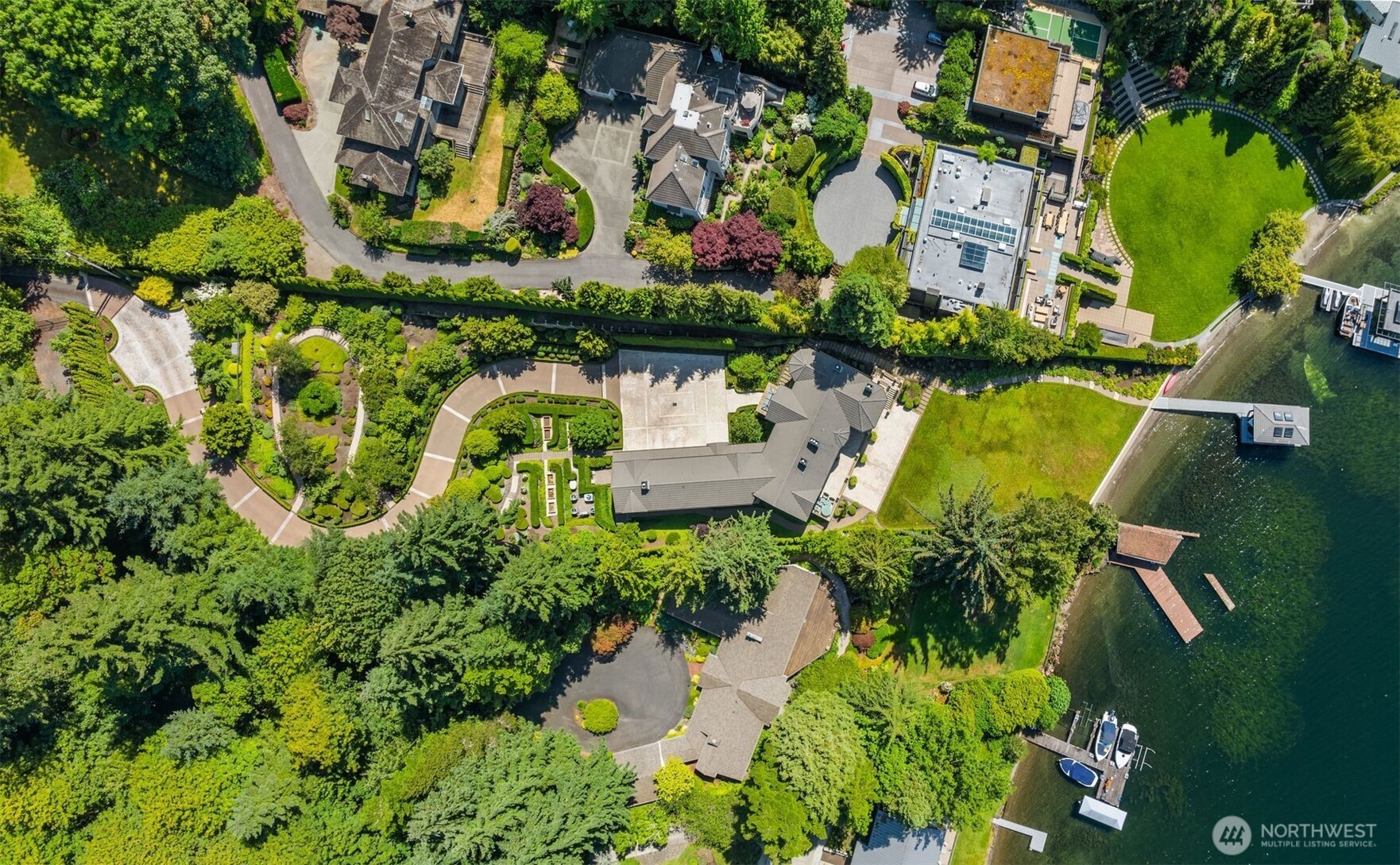 Undisclosed Address Mercer Island, WA 98040 - Photo 26 of 28 an aerial view of a house with a garden