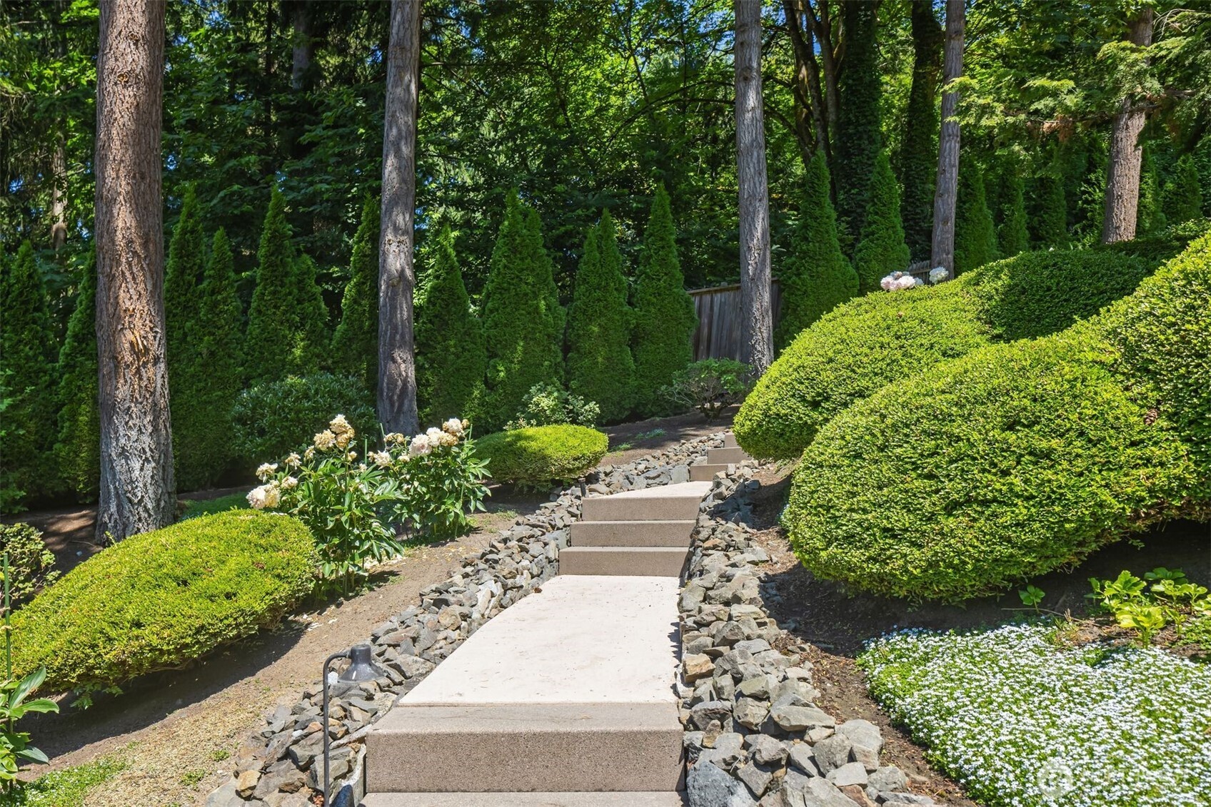 Undisclosed Address Mercer Island, WA 98040 - Photo 27 of 28 a view of a garden with pathway